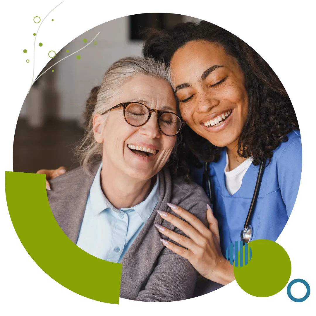 Occupational therapy professional sharing a positive moment with an older adult receiving supportive care in Columbus, OH.