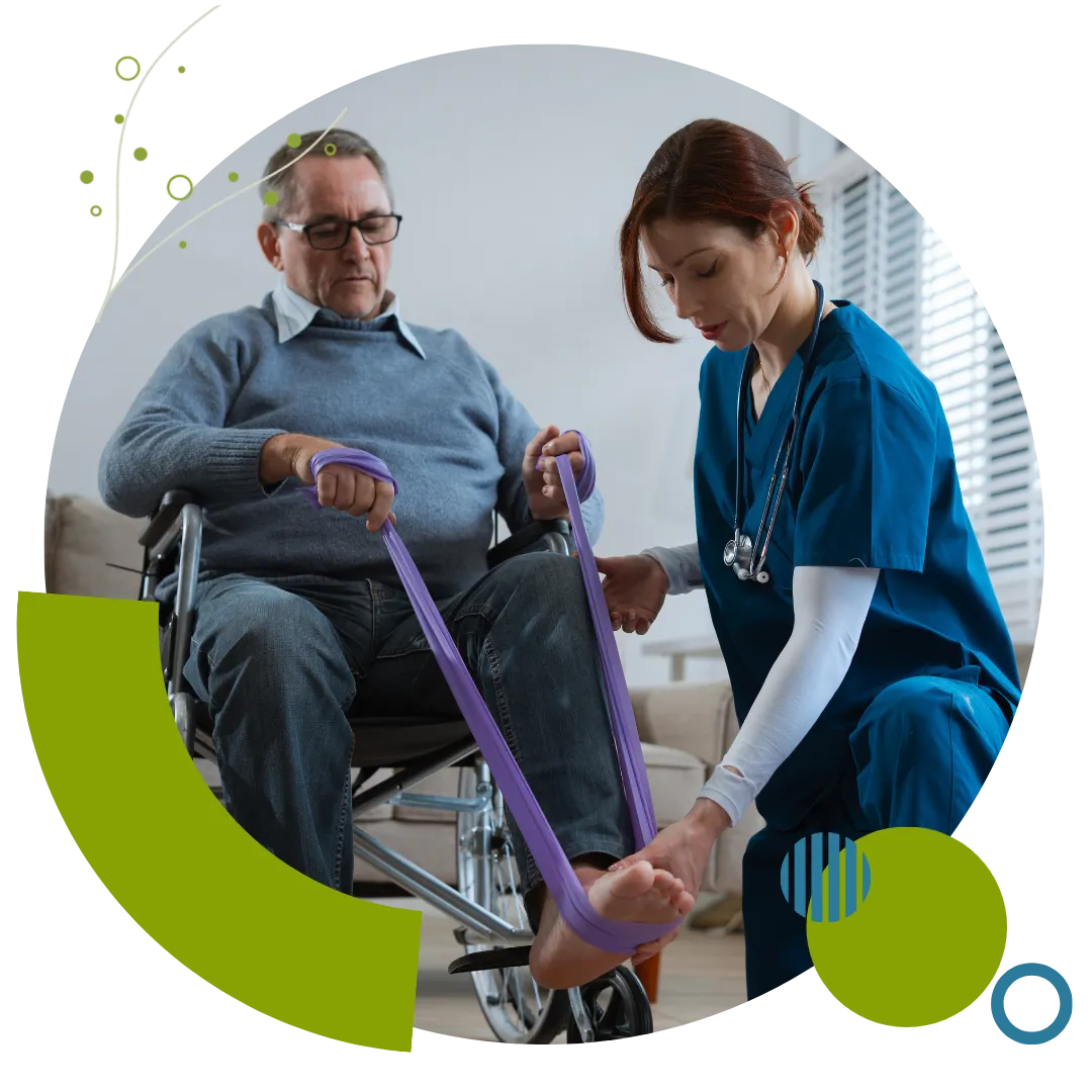 Physical therapist guiding an older adult through resistance band exercises during in-home physical therapy in Columbus, OH.