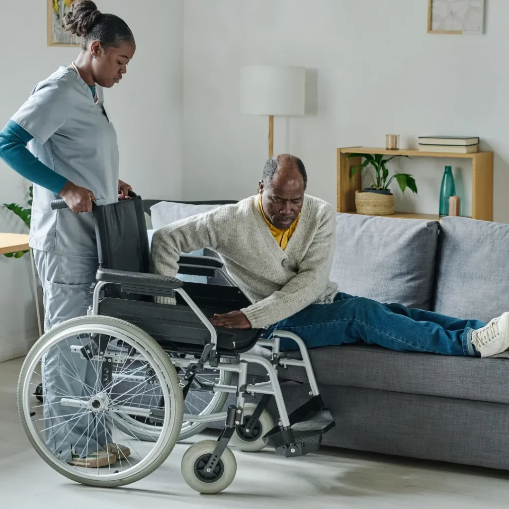 Skilled nursing caregiver assisting an older adult with mobility at home in Columbus, OH.